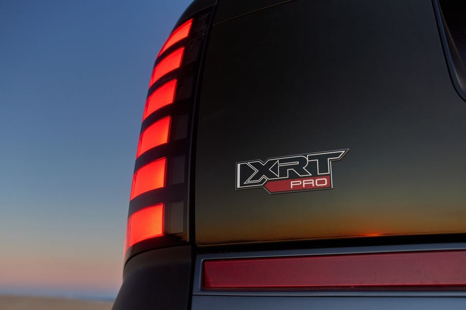 Close-up of the XRT Pro badge and tail light on the 2027 Hyundai Palisade XRT Pro, photographed at dusk