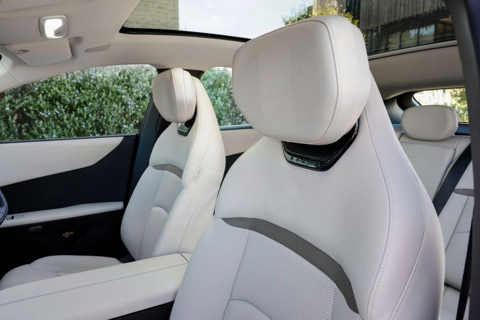 Close-up view of the cream leather front seats and headrests inside a 2027 Mazda CX-6e