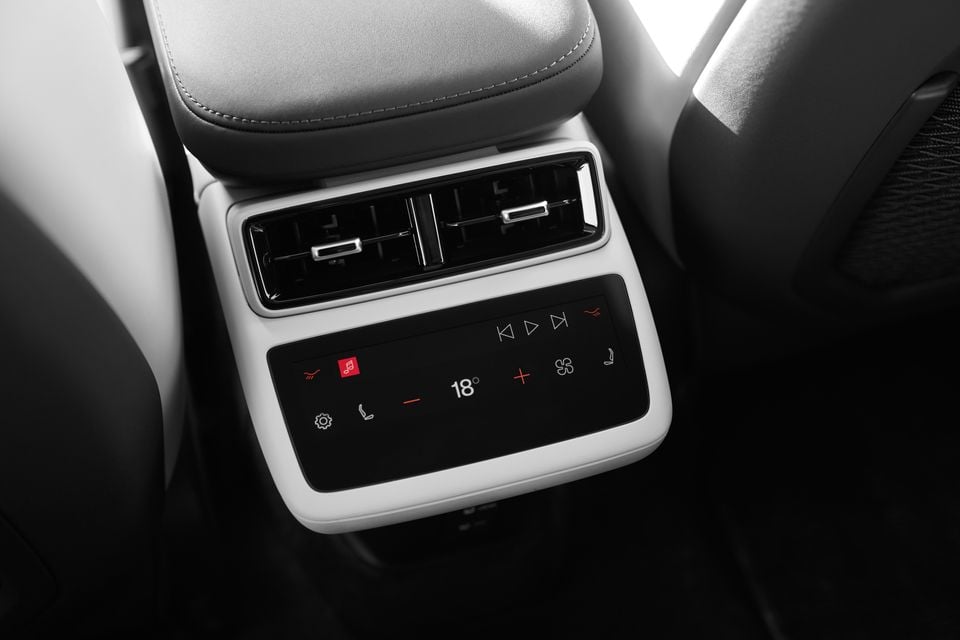 Rear centre console of the 2027 Polestar 4 with air vents and a touch panel for climate, seat heating and media controls