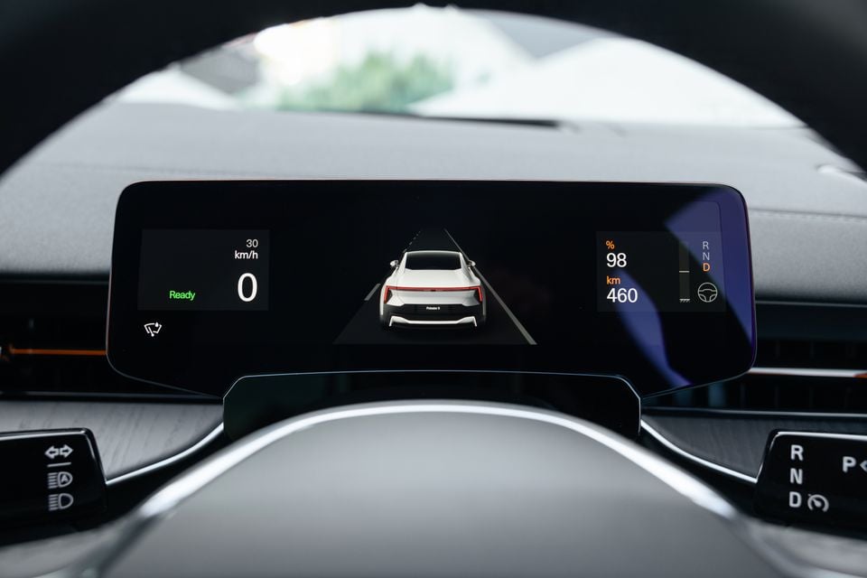 Digital driver display in the 2027 Polestar 5 Performance, seen through the steering wheel, showing speed, 98 per cent battery and 460km range
