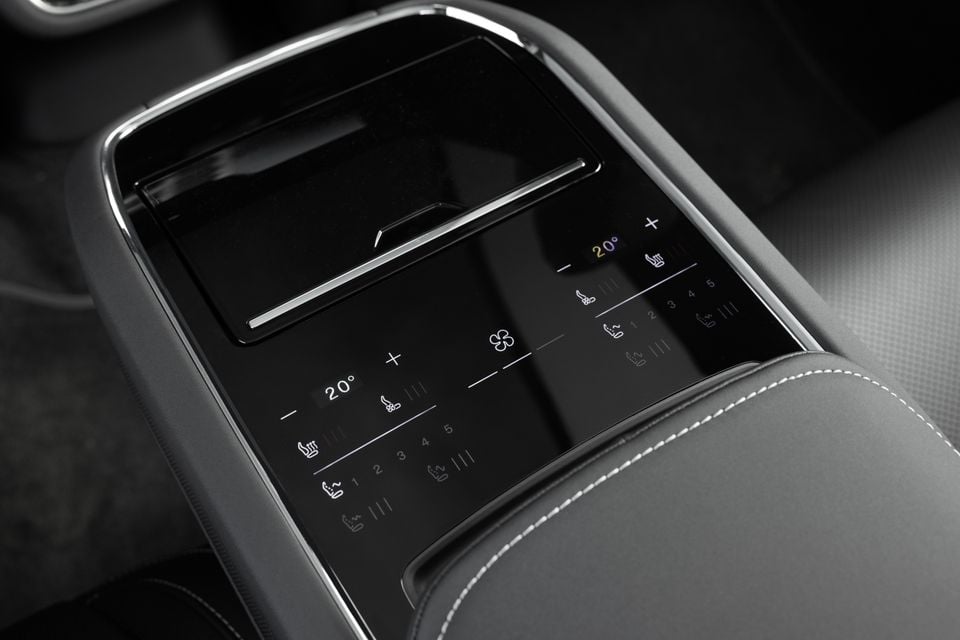 Rear-seat touch control panel with climate, fan and heated seat controls on the centre console of the 2027 Polestar 5 Performance