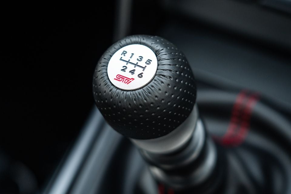 Close-up of the Subaru STI 6-speed manual gear shift knob inside a Subaru BRZ tS