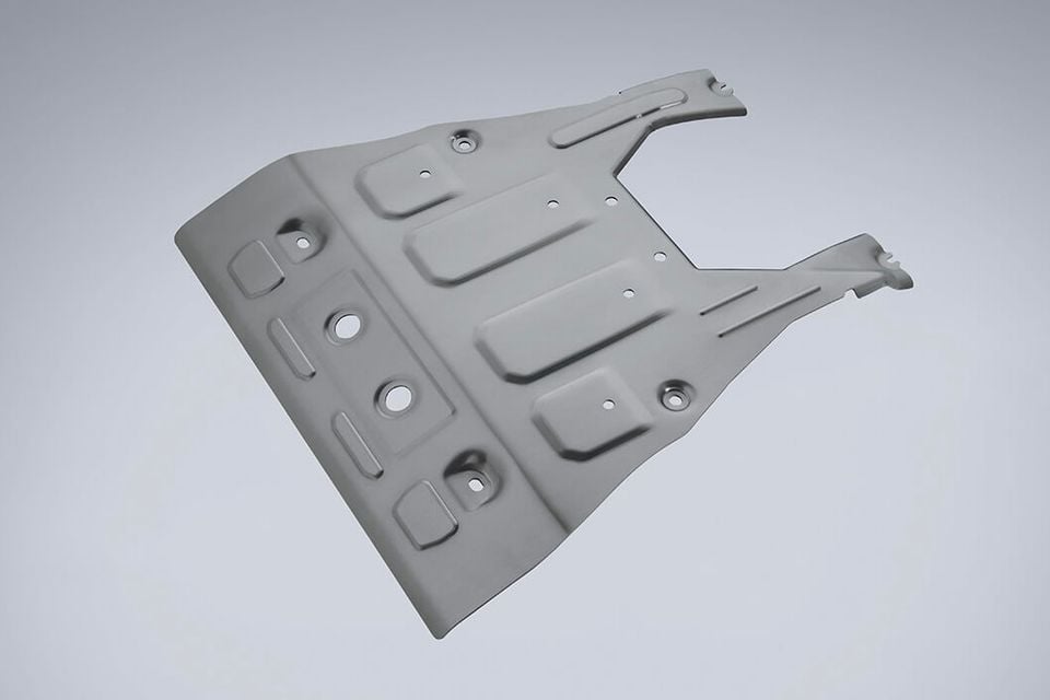 An engine underguard skid plate for the 2027 Subaru Outback Wilderness, shown isolated against a light grey background.