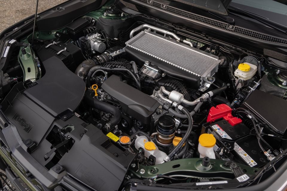 Engine bay of a Subaru Outback Wilderness, showing a turbocharged flat-four engine with an intercooler mounted on top