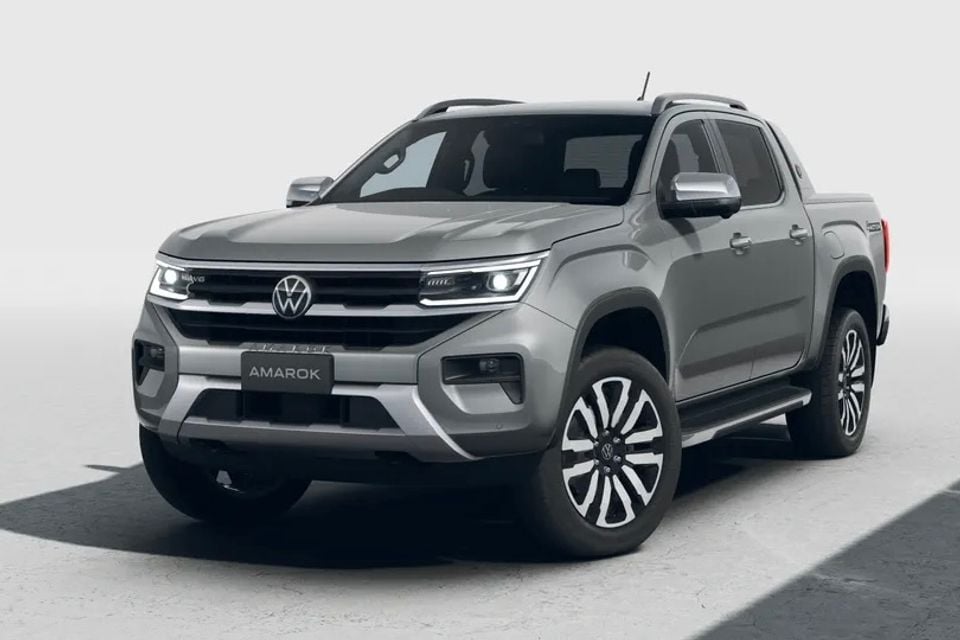 Volkswagen Amarok dual-cab ute in grey, seen from the front three-quarter angle against a light studio background