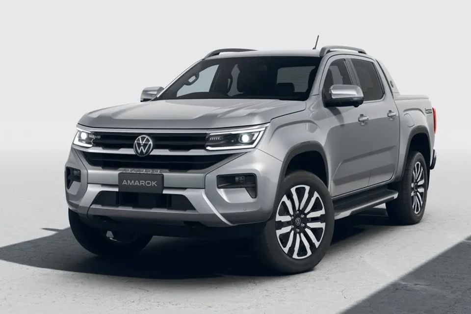 Volkswagen Amarok dual-cab ute in silver, seen from the front three-quarter angle against a light studio background