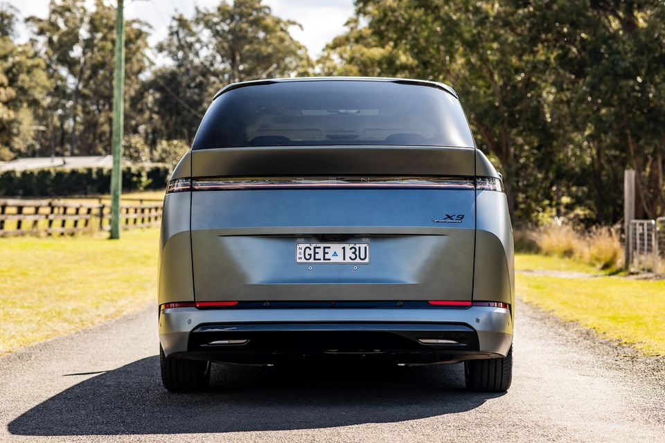 Rear view of a 2027 Xpeng X9 Performance MPV parked on a rural driveway in Australia