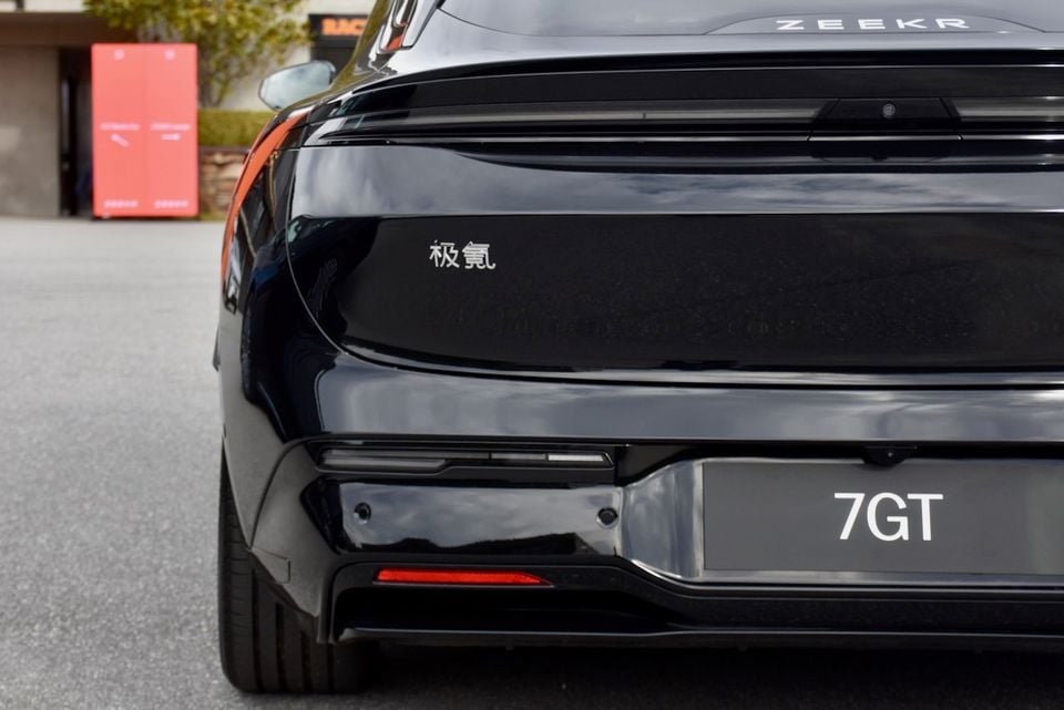 Rear view of a black Zeekr 7GT showing the boot lid badging and rear bumper details