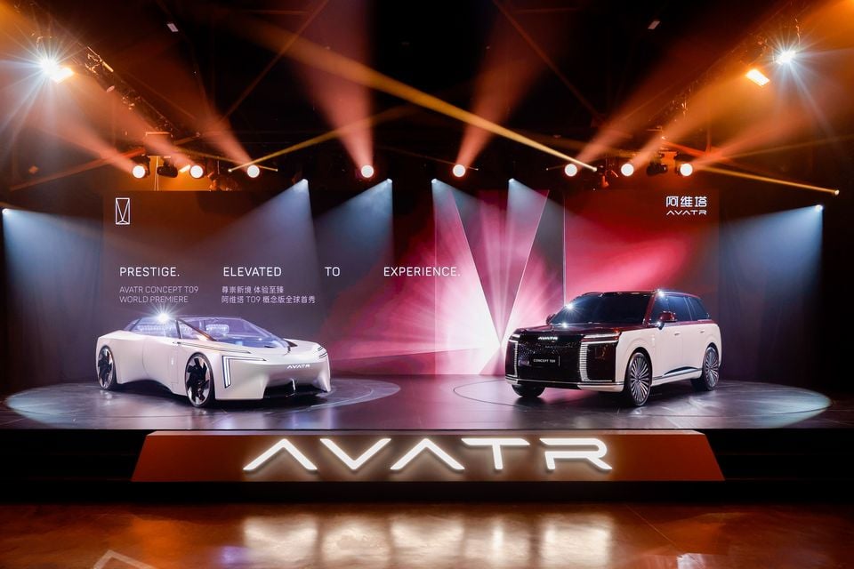 Avatr Concept T09 SUV and a white Avatr concept car displayed on a lit stage at the Concept T09 world premiere