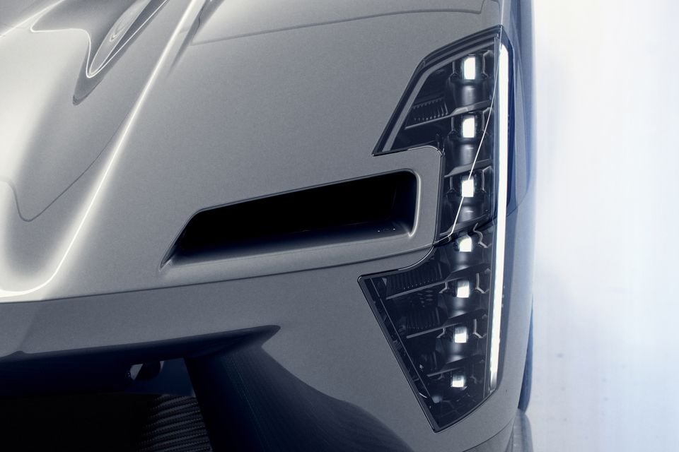 Close-up of the LED headlight and front corner detail on a Cadillac V-One concept car