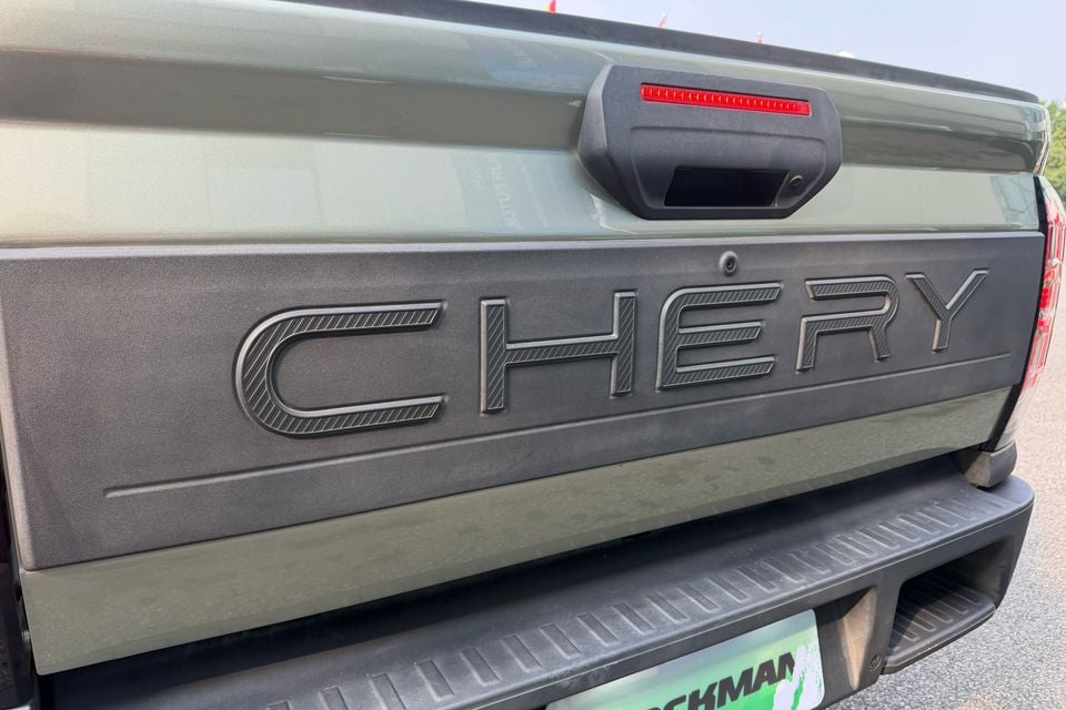 Close-up of the Chery Stockman tailgate handle, CHERY lettering and rear bumper.