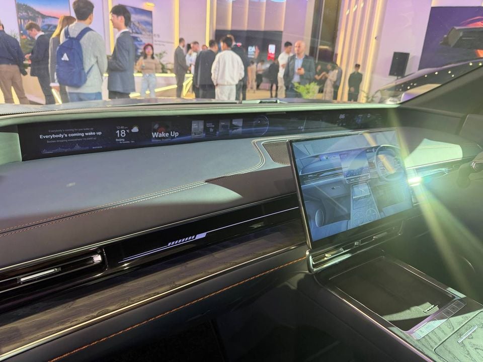 Exlantix cabin dashboard with a full-width display, central touchscreen, metallic trim and centre console at the Shanghai event.