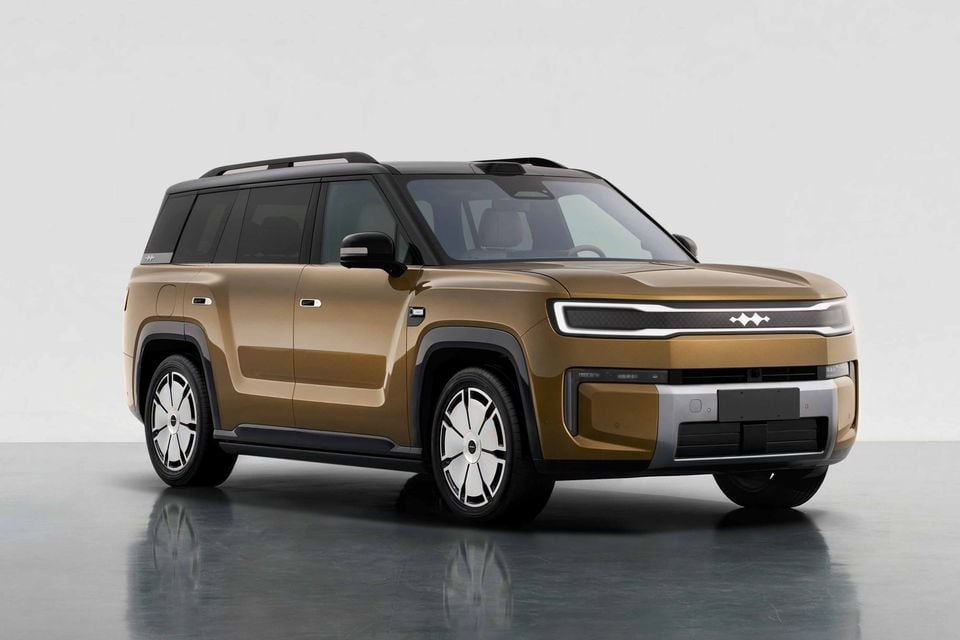 A gold Fangchengbao Tai 9 large SUV shown from a front three-quarter angle against a studio background