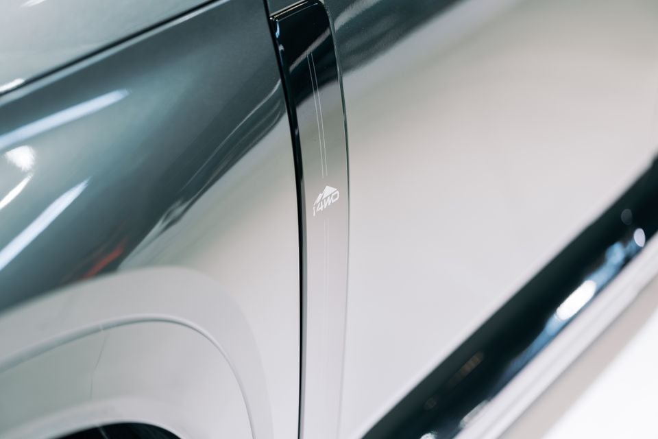 Close-up of the B-pillar on a GAC S7 showing an i4WD badge