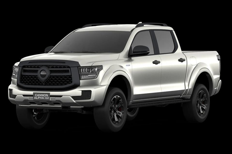A white GWM Cannon Alpha Plug-in Hybrid dual-cab ute seen from the front-side angle against a black background