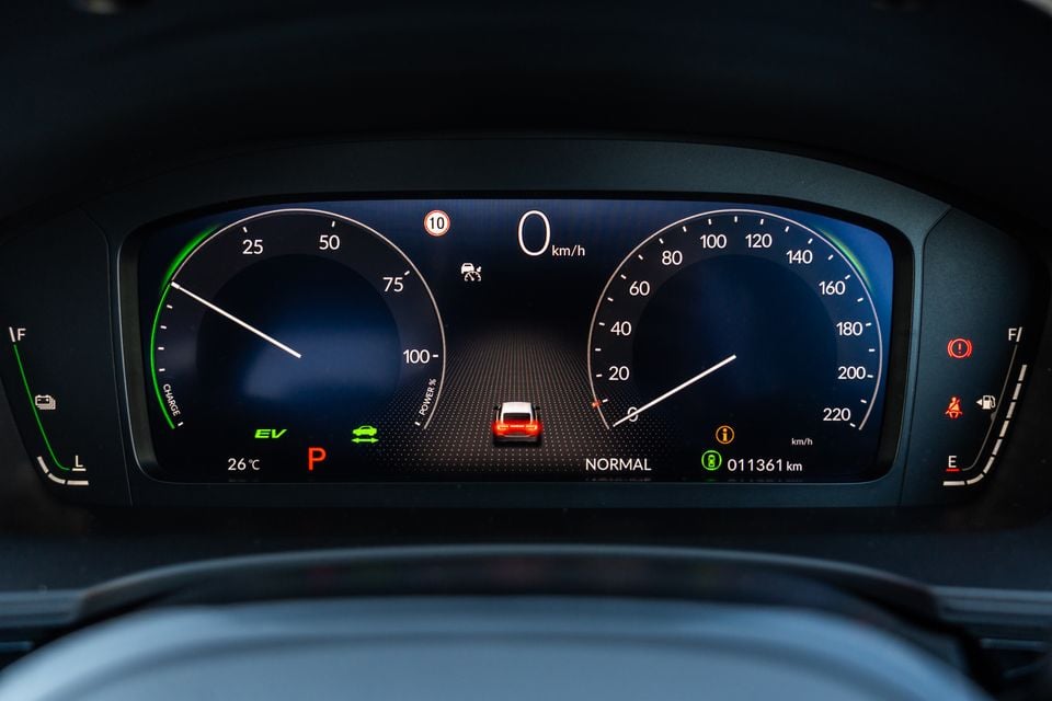 Digital instrument cluster of a Honda Civic e:HEV showing speedometer, power gauge, EV mode indicator, and odometer reading 11,361 km in Normal drive mode