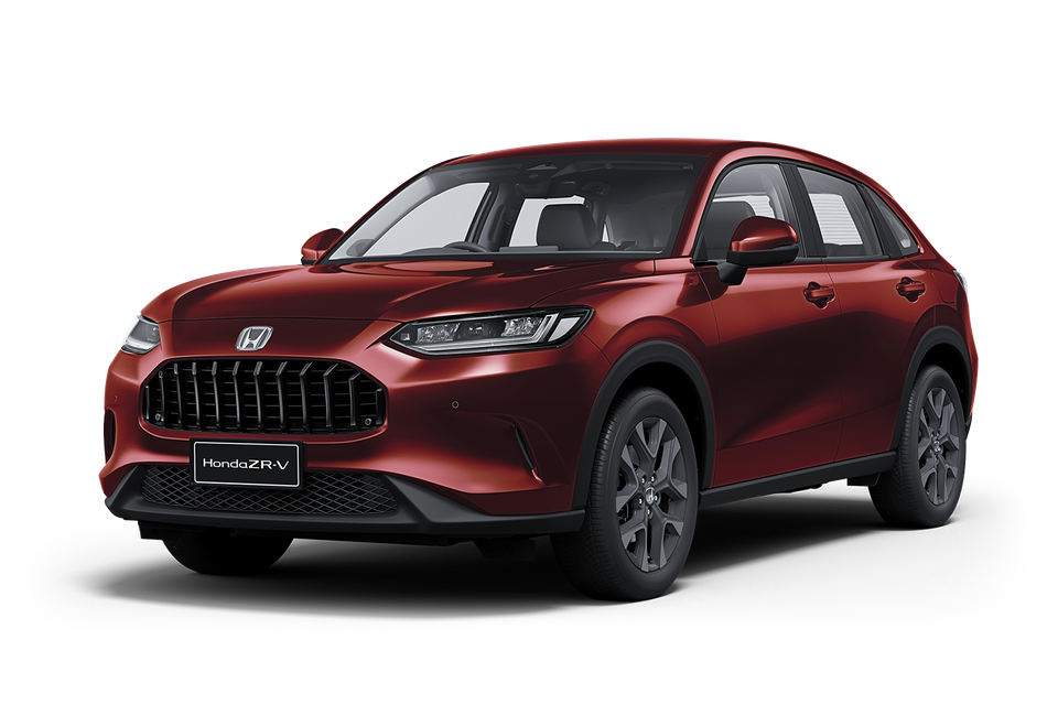 Honda ZR-V SUV in red, seen from the front three-quarter angle on a white background