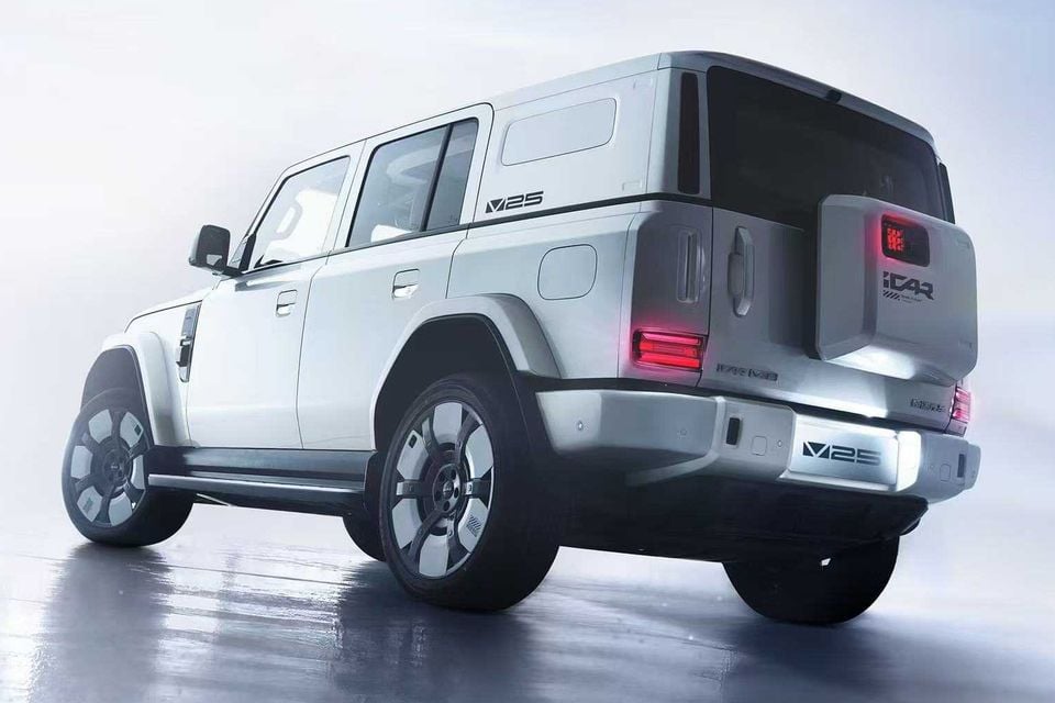 The iCar V25 SUV seen from the rear three-quarter angle, finished in white, showing its boxy off-road styling and tail-lights