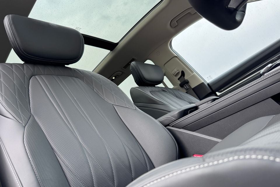 The quilted black leather front seats and panoramic sunroof inside an LDV D90 Luxe SUV.