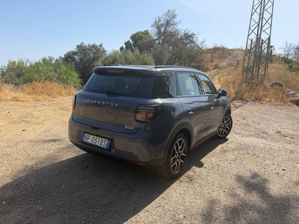 Leapmotor B03X viewed from the rear three-quarter angle on a gravel roadside