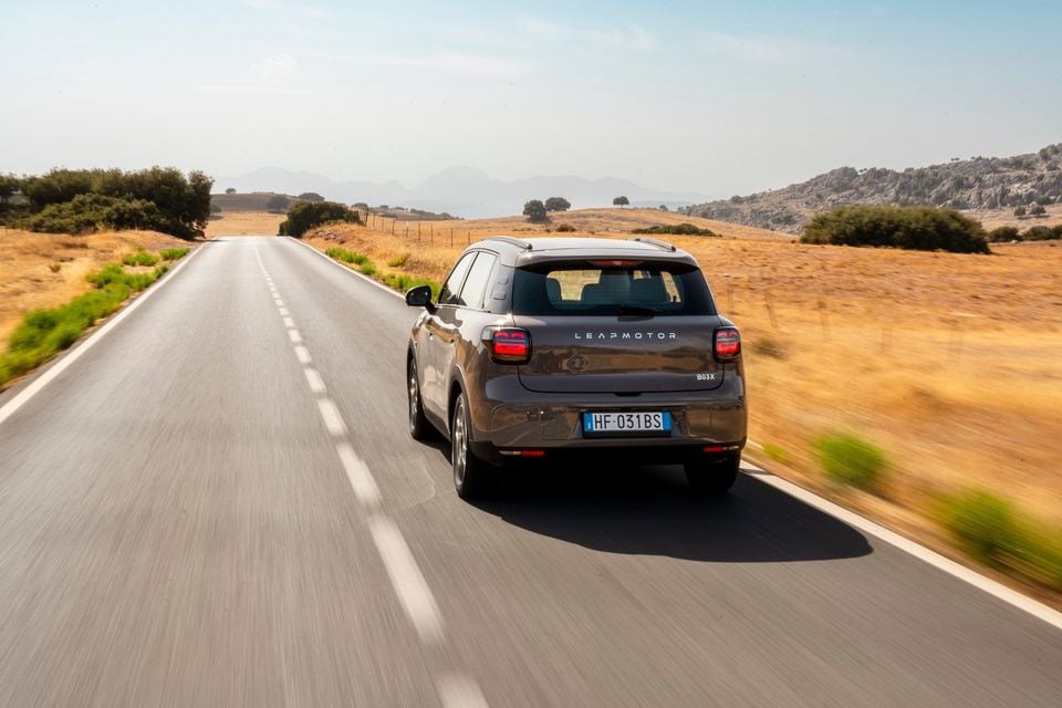 Leapmotor B03X driving rear three‑quarter mountain road