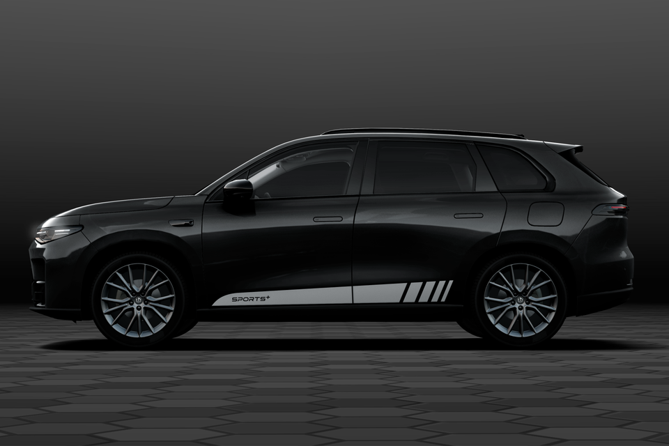 A dark grey Leapmotor C10 AWD Sports+ Special Edition SUV seen side-on with silver Sports+ side stripes in a dark studio