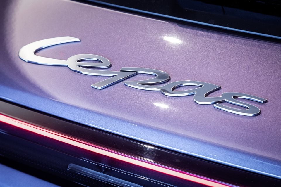 Close-up of the Lepas chrome script badge on the exterior body panel of a car