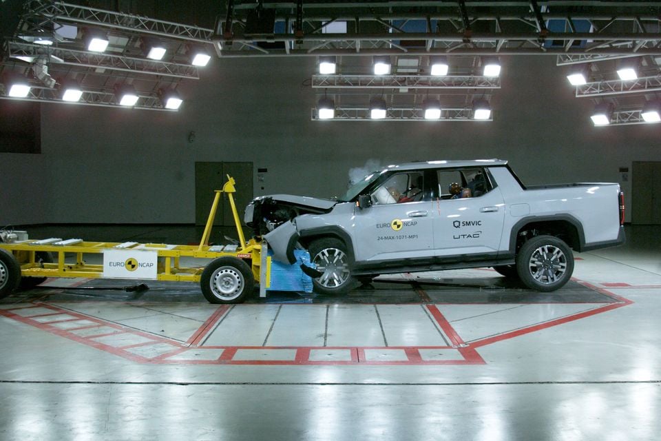 Maxus eTerron 9 electric dual-cab ute seen side-on after hitting a mobile barrier during a Euro NCAP frontal crash test