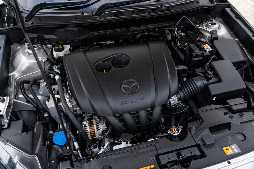 Mazda Skyactiv-G petrol engine bay of a Mazda CX-3, viewed from above with the bonnet open