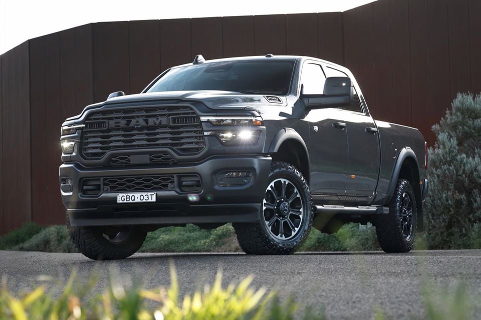 A grey Ram 2500 Warlock ute seen from the front-side angle, parked outdoors with an Australian number plate visible