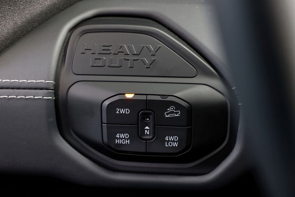 Close-up of the 4WD control dial on a Ram 2500 Heavy Duty, showing 2WD, 4WD High and 4WD Low settings
