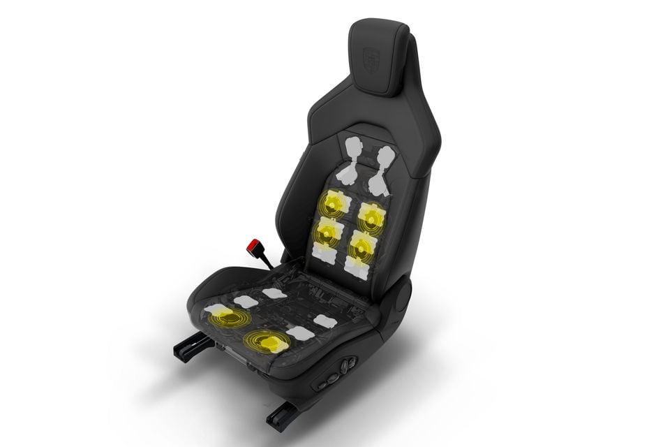 A Porsche Cayenne front seat shown with overlays illustrating the massage function and heating and cooling zones built into the seat's leather upholstery