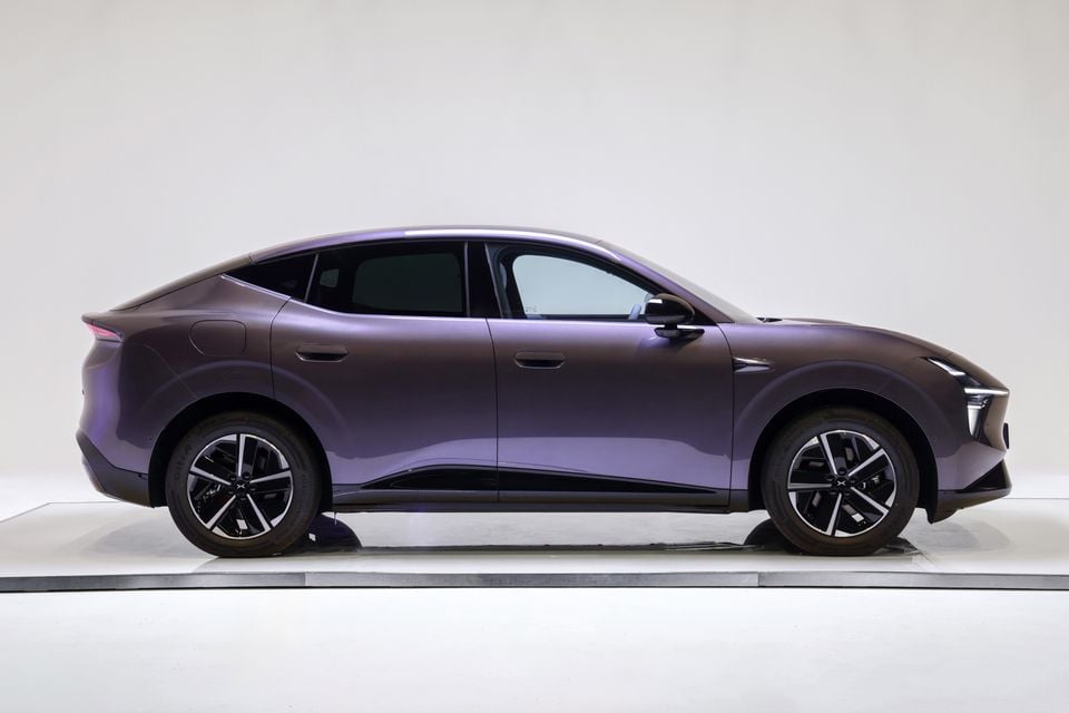 A purple 2026 XPeng L03 SUV shown from the side against a plain studio background