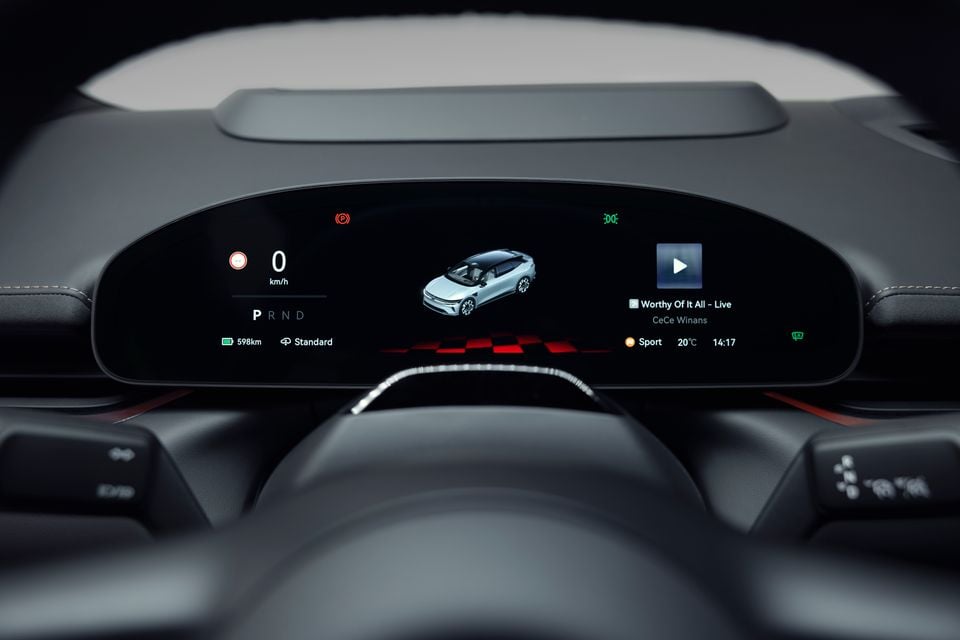 The digital instrument cluster of a Zeekr 7GT showing speed, range, drive mode, and media playback information